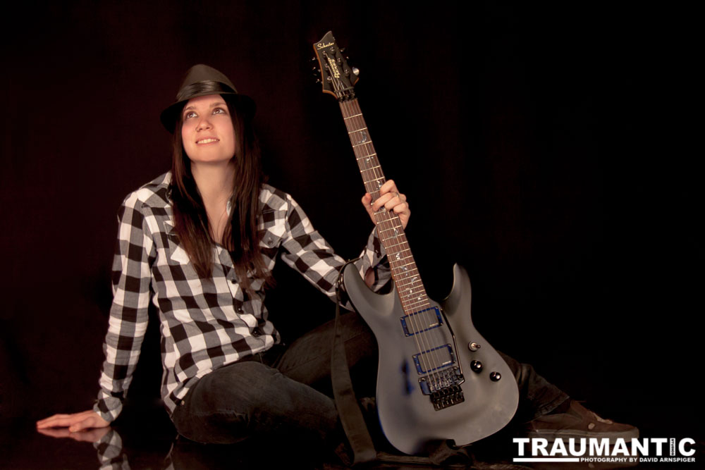 I saw an amazing picture on a web site of this female guitarist.  She was beautiful.  After a bit of searching, I was able to contact her and we did this shoot together.